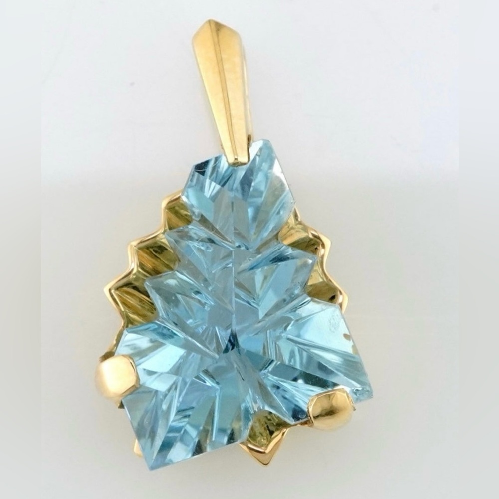 14k yellow gold blue topaz fantasy cut pendant